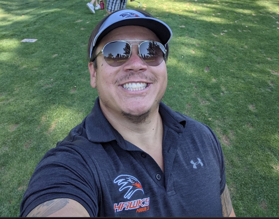 Coach Kyle, founder of Youth Football Coaching Hub.